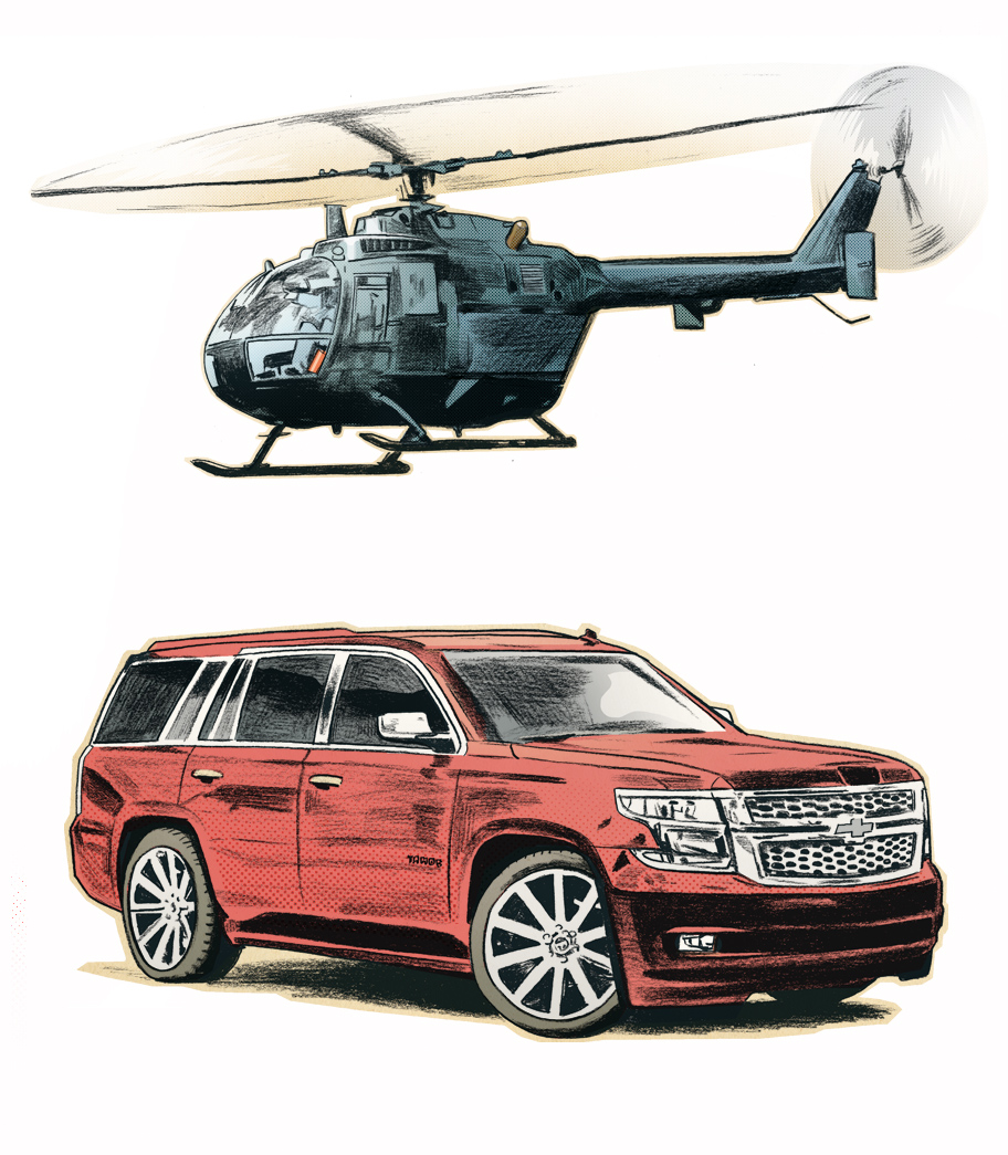 The insignia of wealth: a helicopter and a Chevrolet Tahoe